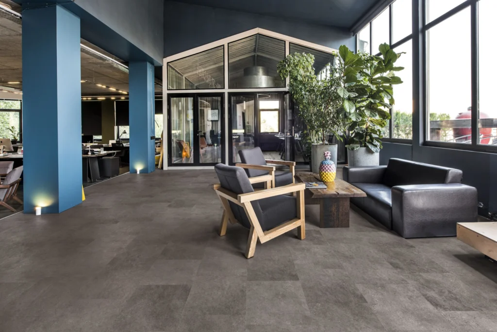 Kährs Kilimanjaro stone-effect luxury vinyl in an open-plan space